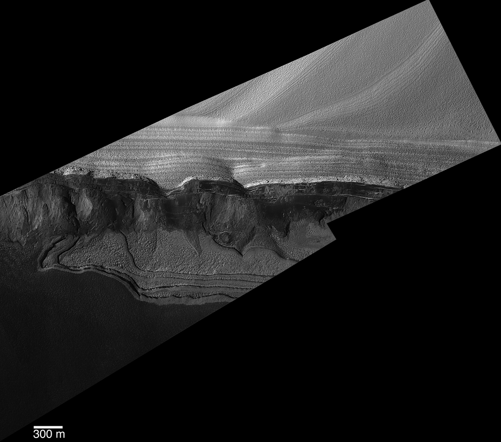 Mosaic of two MOC cPROTO images showing details on a scarp near the head of Chasma Boreale.
