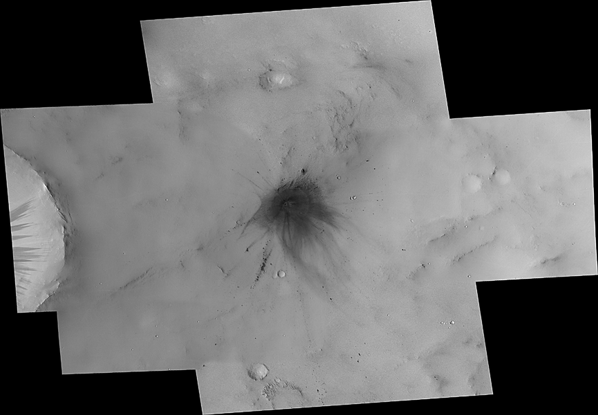 Mosaic of multiple high resolution MOC images covering the impact site and its extensive secondary chains and rays.
