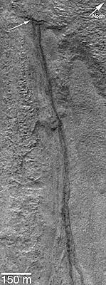 Gullies in Dao Vallis, emergent from beneath small overhang.